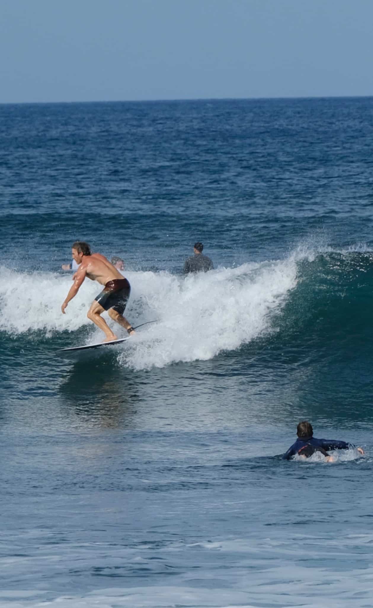 Surfing after a paddle out circle surf tradition