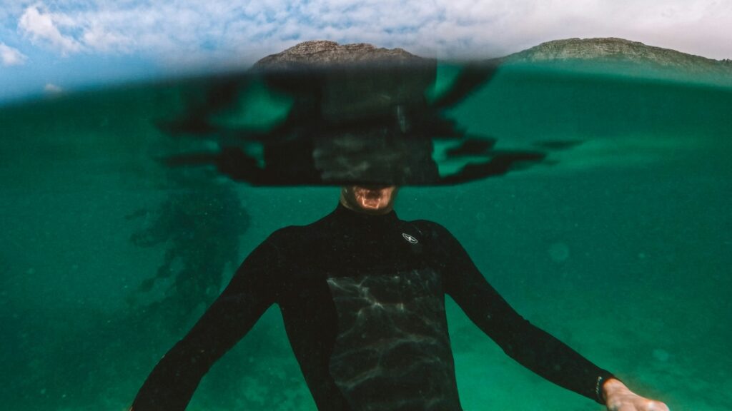 surfer under water after wipeout